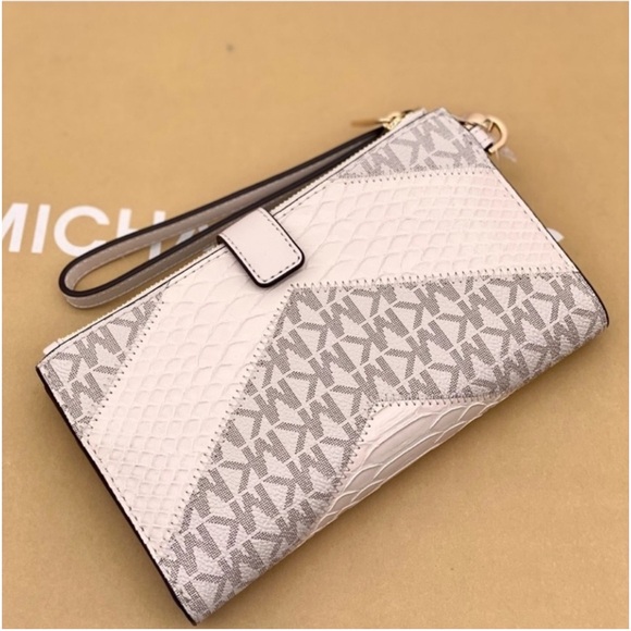 MICHAEL KORS LG
DOUBLE ZIP
WRISTLET
WALLET PHONE
HOLDER LIGHT
CREAM MULTI - Picture 6 of 12